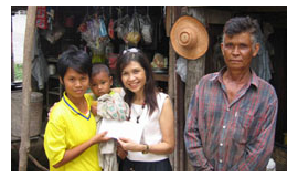 Donation at Pichit, Thailand